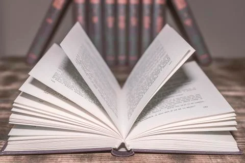 An open book on the table Stock Photos