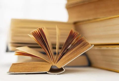 Open book table Stock Photos