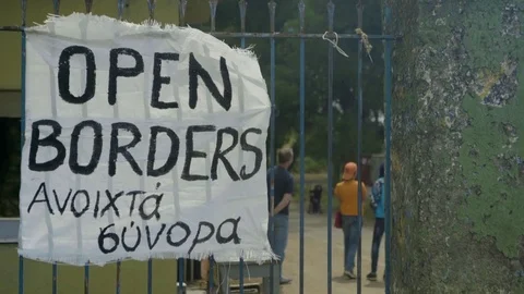 Open border text on entrance gate Stock Footage 77453193