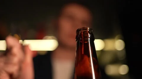 Open the bottle with the bottle opener Stock Footage 239570035