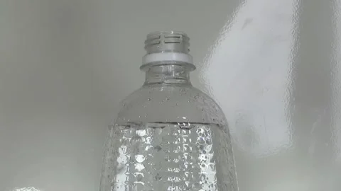 Open Bottle Of Sparkling Water Stock Footage 134748689