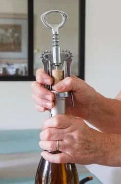 To open a bottle of wine Stock Photos