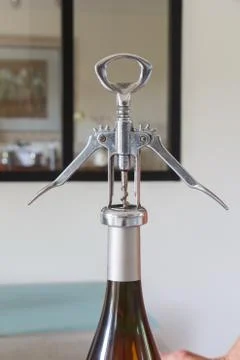 To open a bottle of wine Stock Photos