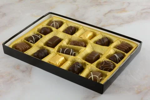 Open box of Belgian chocolates Foto stock