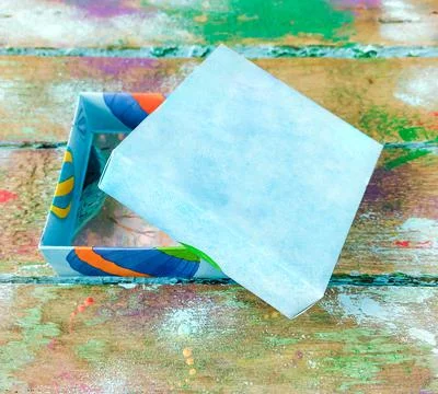 Open box with blue lid Stock Photos