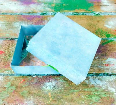 Open box with blue lid Stock Photos