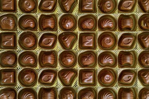 Open box of chocolate treets Stock Photos