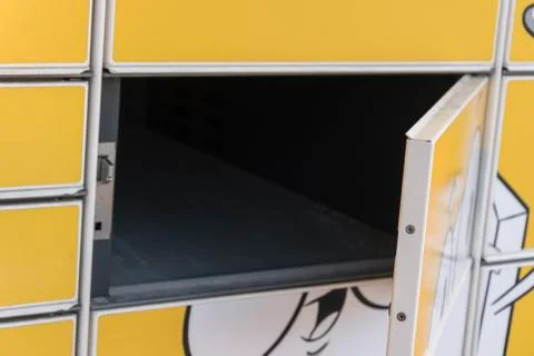 Open box of Inpost parcel locker. WROCLAW, POLAND - April, 2018. 24 hours dro Stock Photos