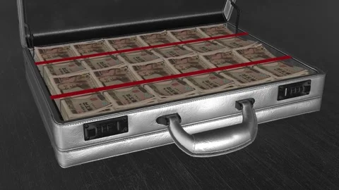 Open briefcase filled with organized 10,000 yen bills, illustrating liquid .. Stock Footage 325657348