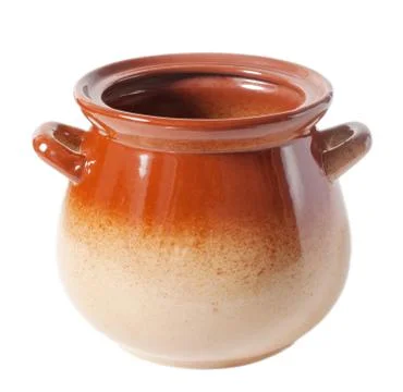 Open brown clay pot without a lid on a white background Stock Photos