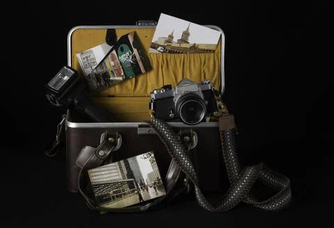 Open camera bag with old camera, flashlight and stuff 스톡 사진