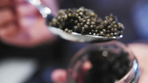 Open can of black caviar Stock Footage 169226520