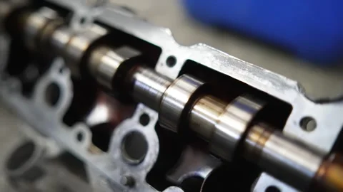 Open car engine close-up. An auto mechanic in a garage repairing a car engine Stock Footage 276188913