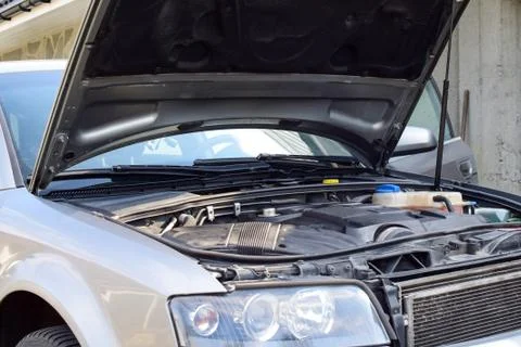 Open car hood. Engine close-up. Stock Photos
