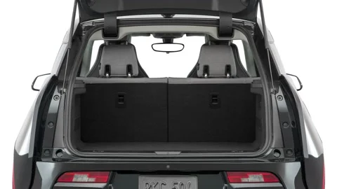 Open car trunk close up Modern Steel Metallic 2016 BMW i3 with Range Extender Stock Footage 159885570