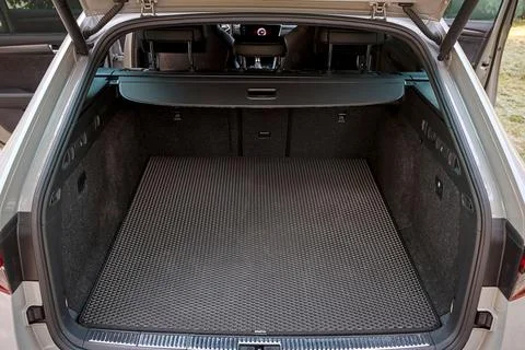 Open car trunk with protective cargo mat Photos