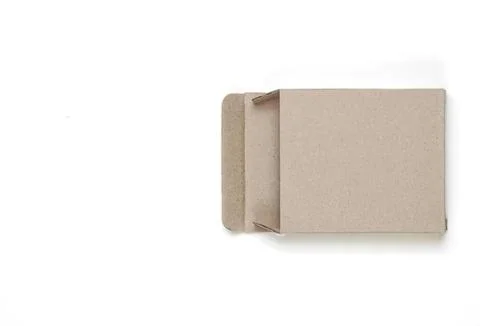 Open cardboard box on white background for packaging or storage Stock Photos