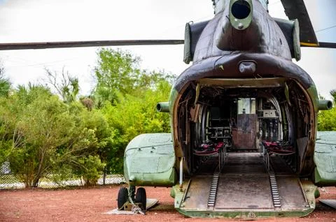 Open cargo door and ramp to a large military helicopter Stock Photos