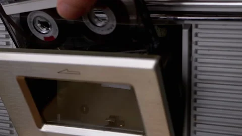 Open Cassette Deck of Old Tape Recorder, Insert 90s Cassette, Close with Fingers 動画素材 148763199