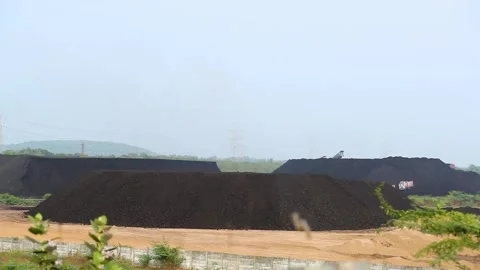 Open Cast Coal Mine with Excavator and Coal Stockpiles in Gujarat, India 01 Stock Footage 340947254