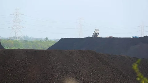 Open Cast Coal Mine with Excavator and Coal Stockpiles in Gujarat, India 04 Stock Footage 340947334