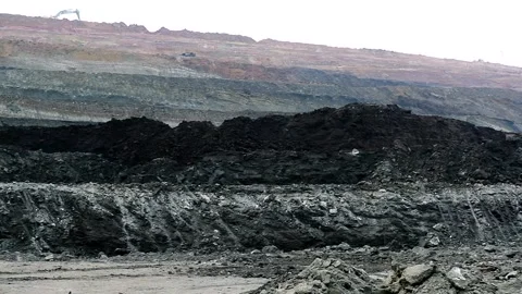 Open Cast Coal Mine with Excavator and Coal Stockpiles in Gujarat, India 10 Stock Footage 340947442