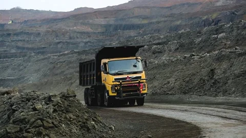 Open Cast Coal Mine with Excavator and Coal Stockpiles in Gujarat, India 11 Stock Footage 340947454