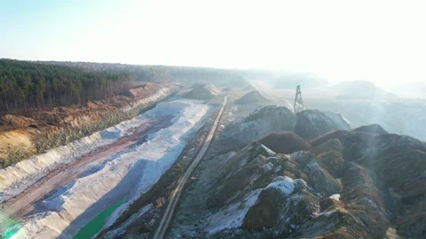 Open cast mine. Walking dragline excavator on development chalk open pit 動画素材 186507016