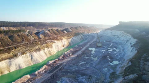Open cast mine. Walking dragline excavator on development chalk open pit Stock Footage 186507944