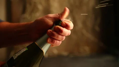Open champagne against the background of lights. Stock Footage 168007952