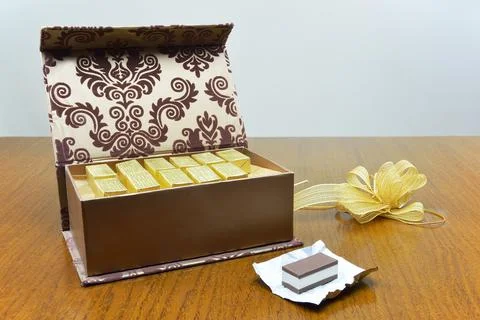 Open chocolate box Stock Photos