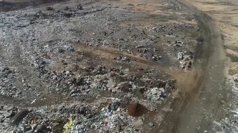 Open city garbage dump, general plan, top view, camera movement. Birds fly,  Stock Footage 150017965