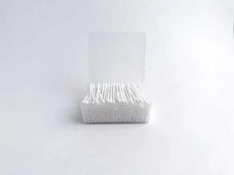 Open clear plastic rectangular box filled with white cotton buds isolated o.. Stock Photos