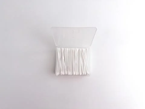 Open clear plastic rectangular box filled with white cotton buds isolated o.. Stock Photos