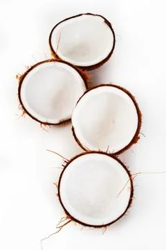 Open coconut on white background Stock Photos