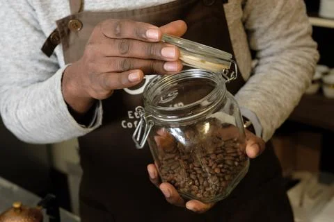 Open the coffee bean storage container Stock Photos