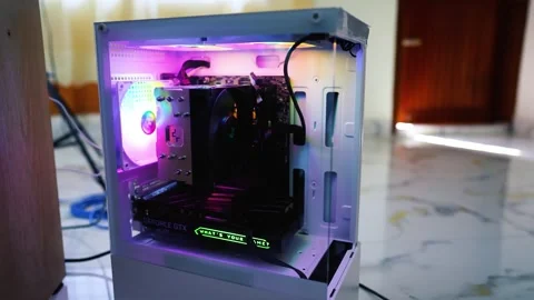 Open computer case with RGB lighting and visible components Stock Footage 315981903