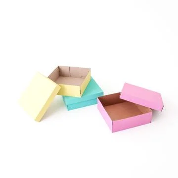 Open craft colored boxes on a white background. The concept of gift, packag.. Stock Photos