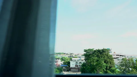 Open curtain of window of building  Stock Footage 140215368