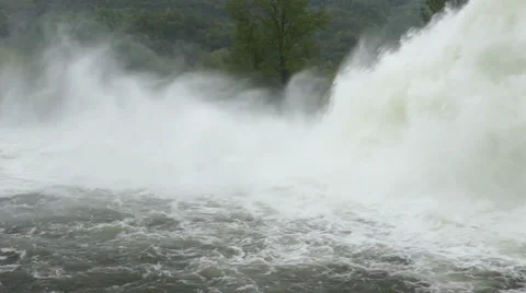 Open dam discharged a large amount of water from lake reservoir, stream, jets. Stock-Footage 37792016
