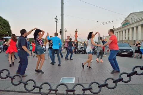 Open dance class on the spit of Vasilievsky island in the evenin Stock Photos