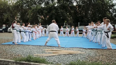 Open demonstration karate training on the street.  Stock Footage 119854569
