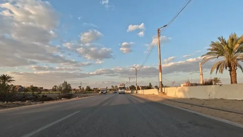 Open desert highway experience along Cairo Fayoum Desert Road wide horizons Video stock 330082068