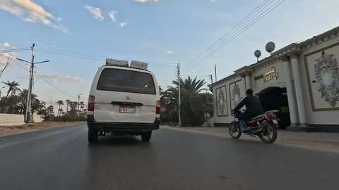Open desert road experience along Cairo Fayoum Desert Road endless horizons Stock Footage 330080362