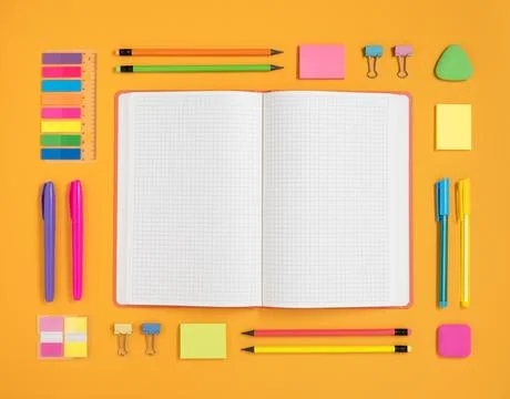Open diary for your text in frame of bright school and office supplies Stock Photos