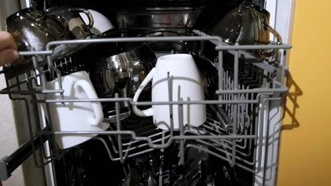Open dishwasher with clean dishes in the kitchen. Slow motion Stock-Footage 224705850