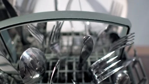 Open dishwasher with clean dishes in the white kitchen Stock Footage 95955845