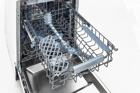 Open Dishwasher Interior On White Stock Photos