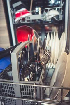 Open dishwasher in a kitchen Stock Photos