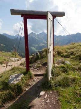 Open door in the alps Stock Photos